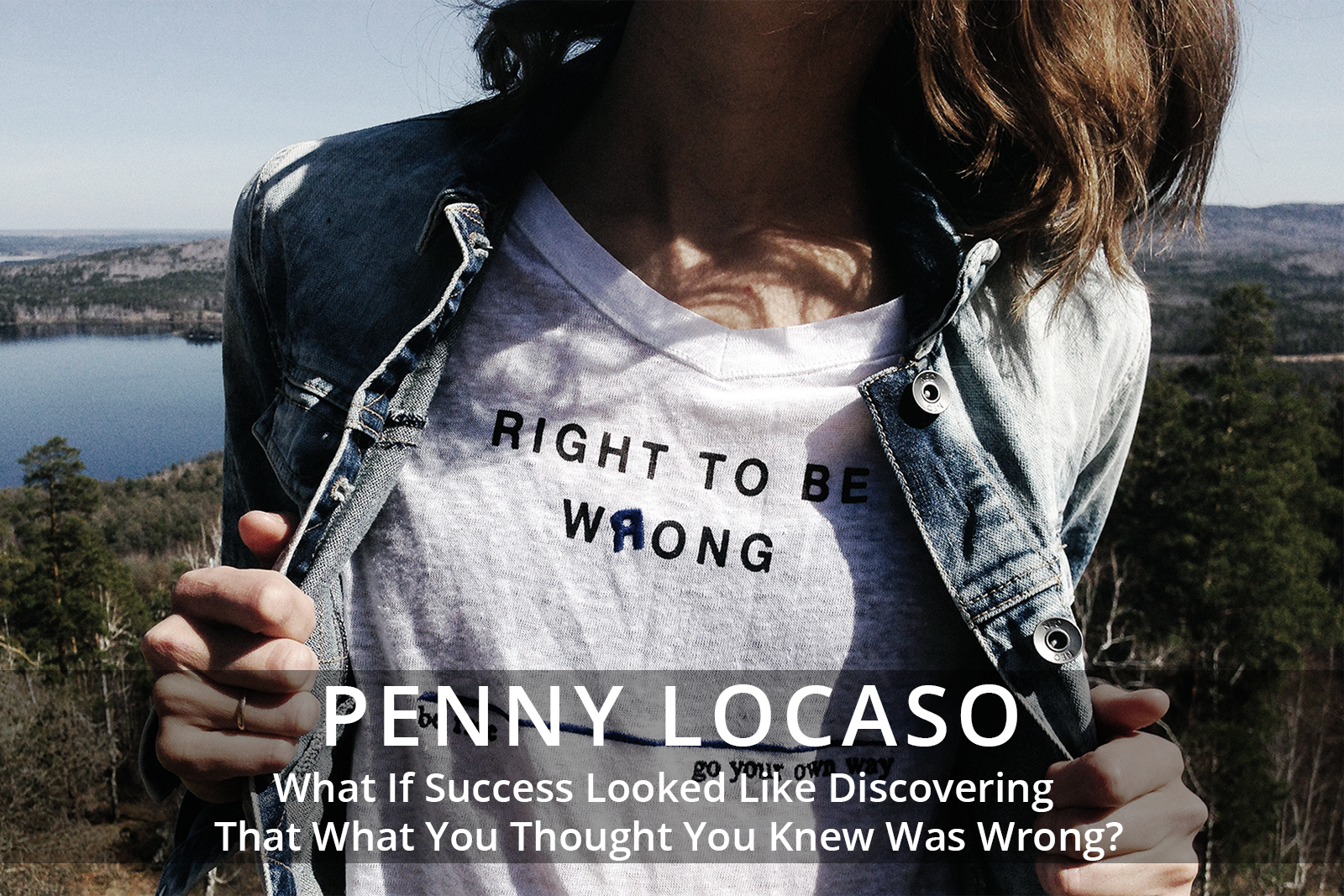Female participants in a workshop sit in front of a graffiti wall.